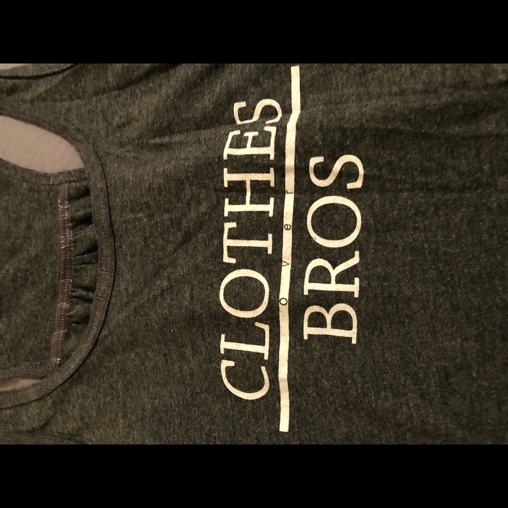 Clothes over bro’s tank top